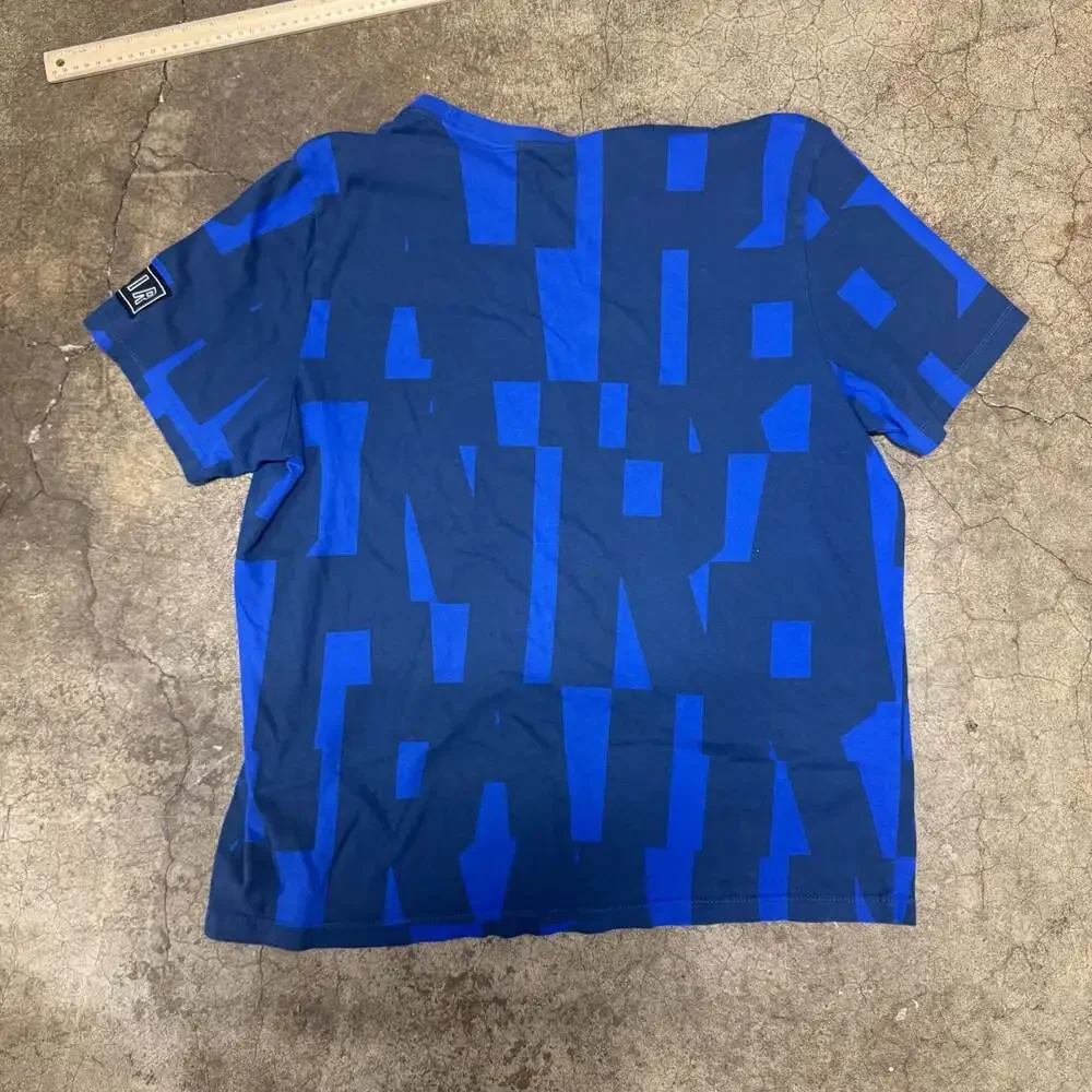Nike Air All-Over Print Logo Graphic T-Shirt